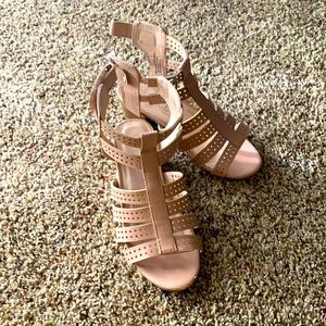 Creme colored shoes for a fashionable little girl in a size 11